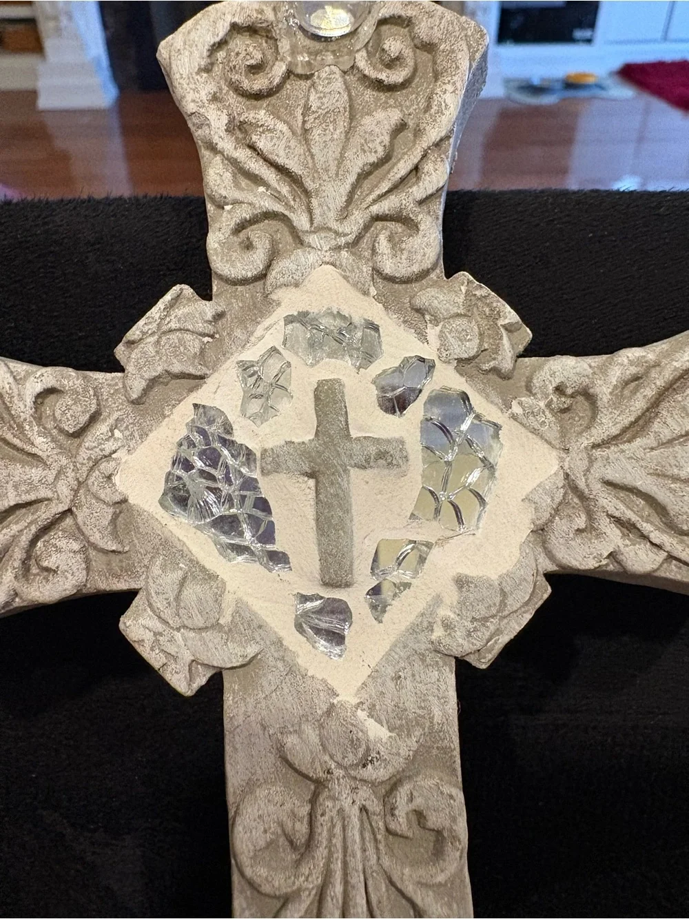 Ornate grey stone-look wall cross
